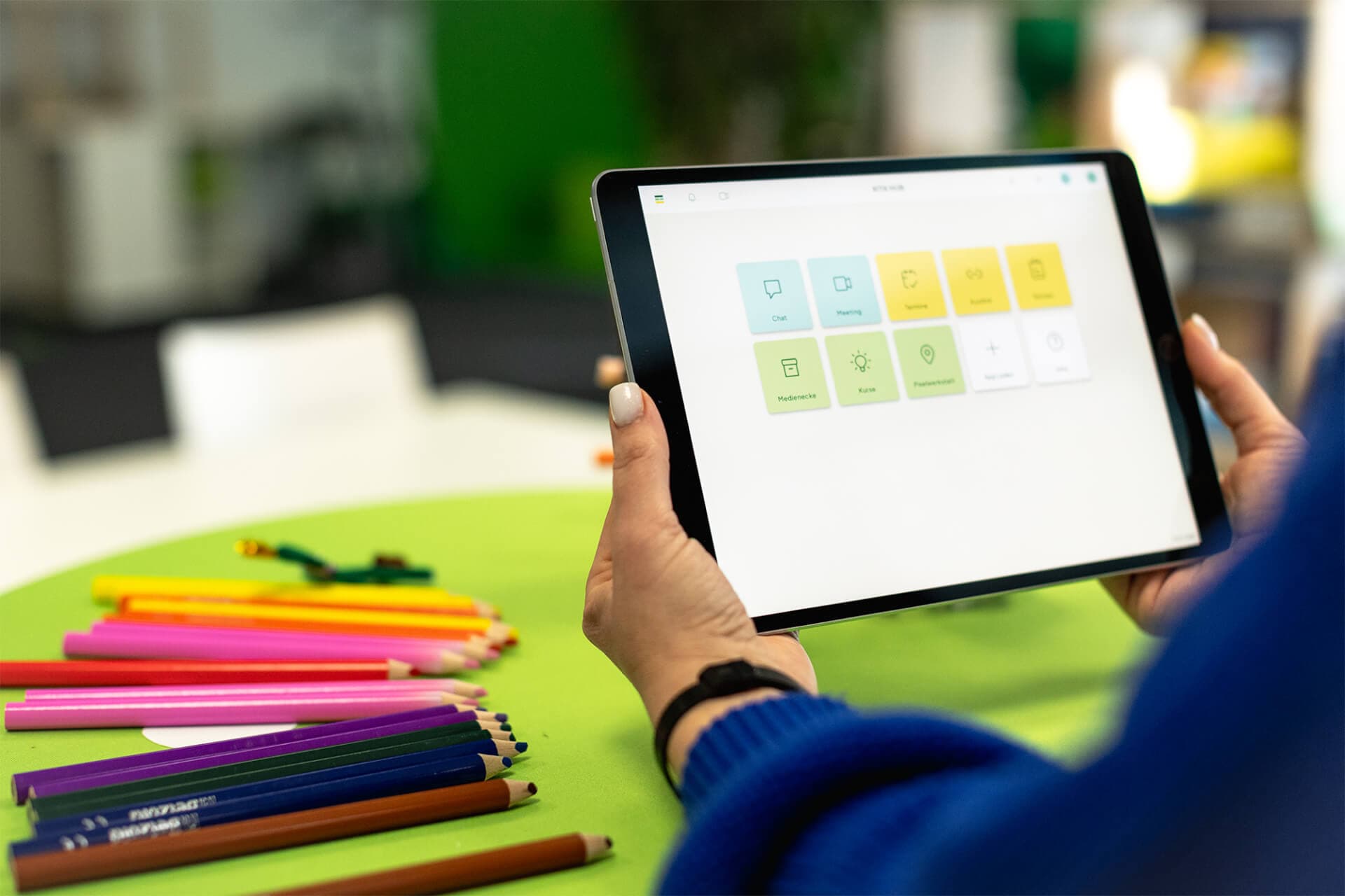 close up of an ipad with the KITA HUB app opened